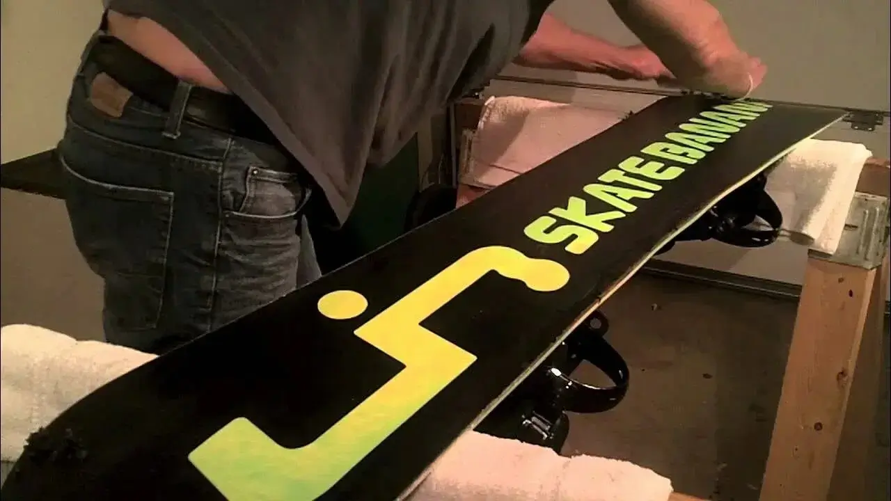 A freshly pressed snowboard base cooling.