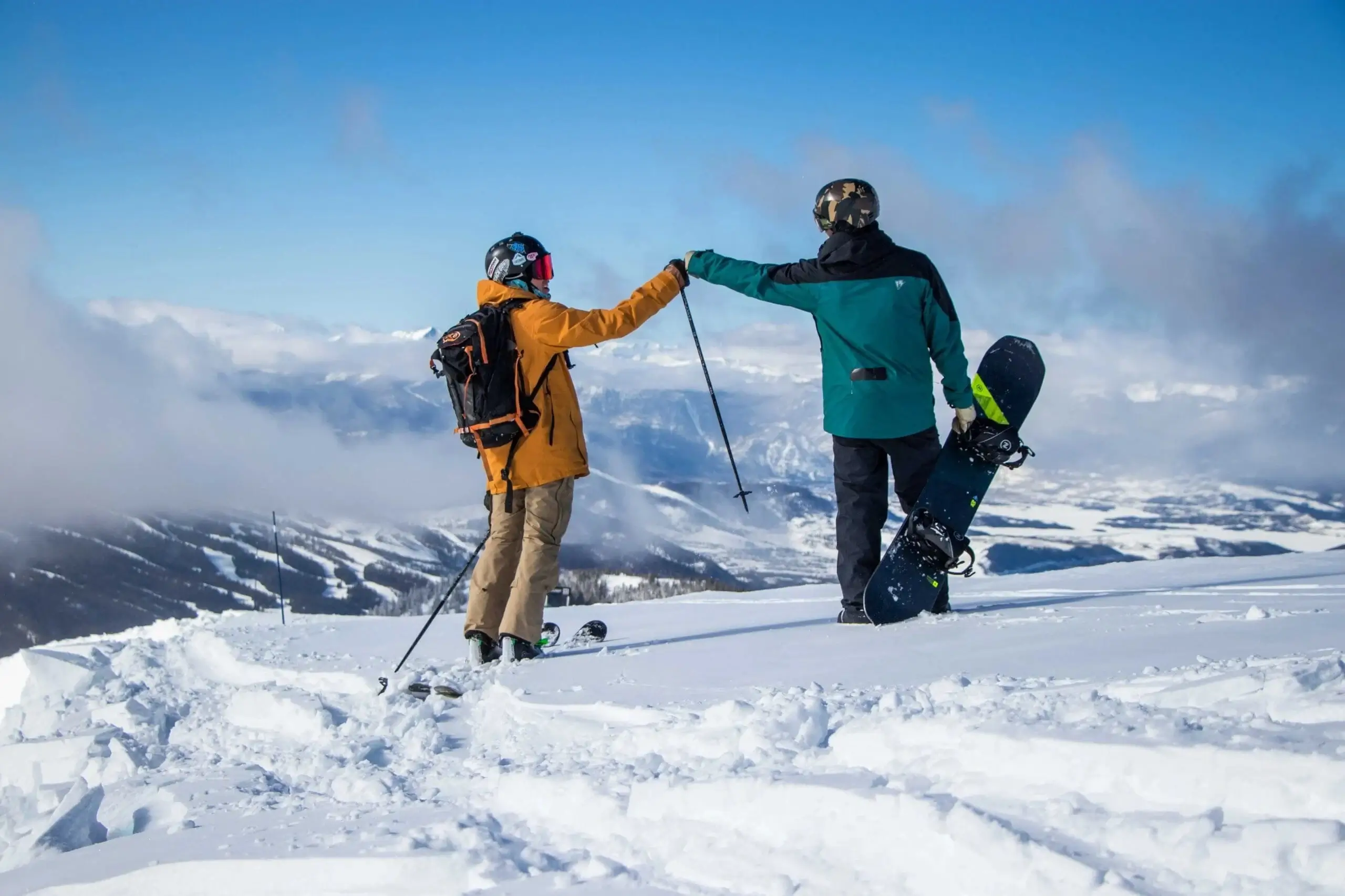 A group of skiers enjoying a powder day.